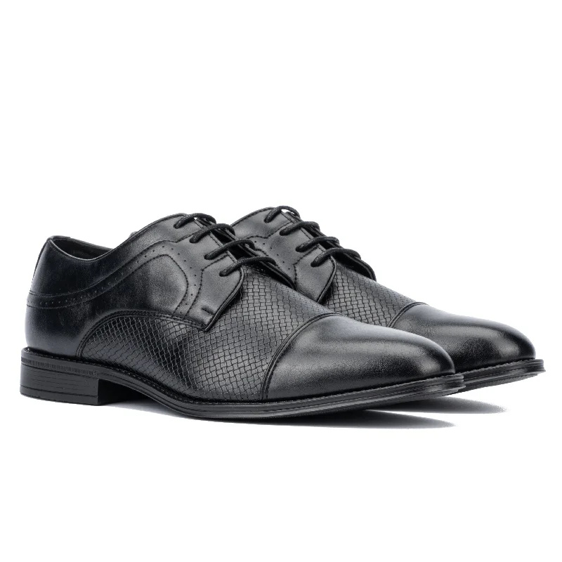 Brogue - perforated men's Oxfords for a traditional lookMen's Deven Dress Oxford