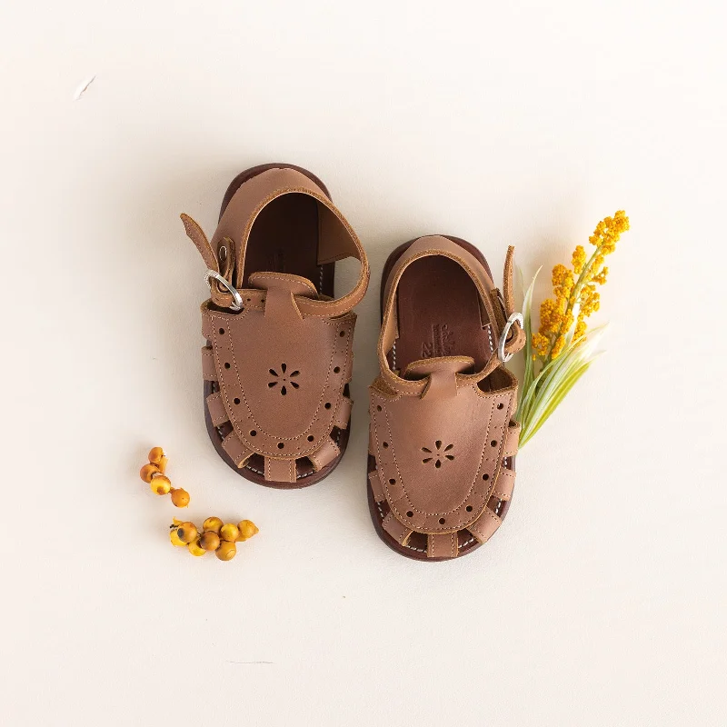 Men's sandals with a decorative buckle or charmMen's sandals with a decorative buckle or charmFlora {Children's Leather Sandals}