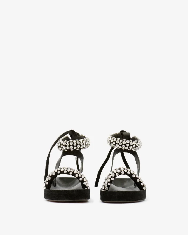 Men's sandals with a decorative buckle or charmMen's sandals with a decorative buckle or charmMellan Sandals